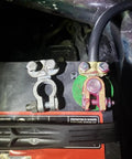 Beefy Brass Battery Terminals Top Post Connectors Clamps Set installed on a car battery for marine and RV use.