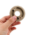 Beefed Up Replacement Gear For Electric Cup Sealing Machines Made From Durable Plastic, Helps Prevent Leaks And Spills, Stable Performance For Beverage Service, Easy Install And Long Lasting Wear. Grey plastic gear held by hand