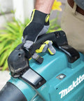 Close-up of a hand gripping the handle of the Game Changing Cordless Leaf Blower Kit Equipped With A Brushless Motor.