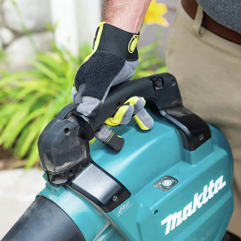 Close-up of a hand gripping the handle of the Game Changing Cordless Leaf Blower Kit Equipped With A Brushless Motor.