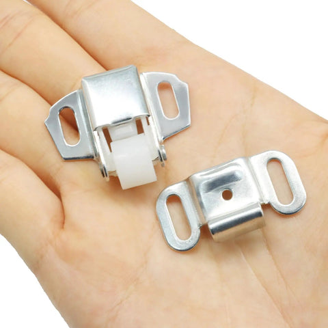Hassle Free Replacement Nylon Roller Mailbox Catch Latch With Spring Loaded Mechanism And Heavy Duty Iron Construction for cabinet use, shown in hand.