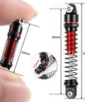 Close-up of 28mm RC Oil Shocks 4 Pack Aluminum Shock Absorbers detailing size and red spring for SCX30 RC crawler upgrades