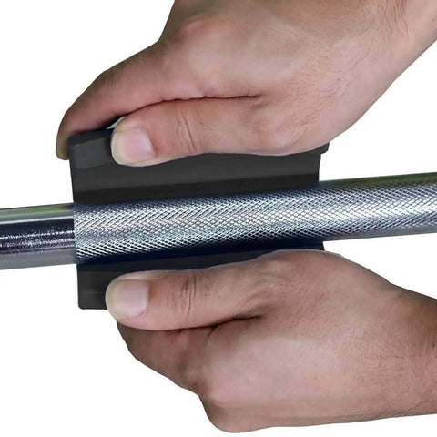 Hands using Thick 1 Inch Barbell Grip For Dumbbells And Weightlifting Bars, Upgraded Silicone Rubber Grips for enhanced grip.