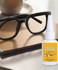 Glasses Repair Glue For Instant Bonding Of Eyeglass Frames With A Fine Tip Applicator beside black eyeglass frames on table