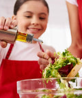 Set Of 2 Stainless Steel Pourers For Liquor Olive Oil And Vinegar Bottles With Tapered Stopper Spouts No Spill Control Sealed Dust Caps Fits About Three Quarters Inch Bottle Openings Durable And Easy To Clean Built Like A Tank, on oil bottle pouring salad dressing