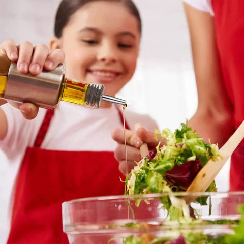 Set Of 2 Stainless Steel Pourers For Liquor Olive Oil And Vinegar Bottles With Tapered Stopper Spouts No Spill Control Sealed Dust Caps Fits About Three Quarters Inch Bottle Openings Durable And Easy To Clean Built Like A Tank, on oil bottle pouring salad dressing