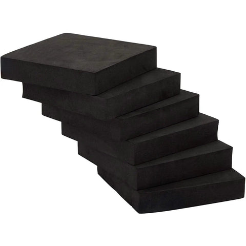 Stack of six black 4x4 inch high density EVA foam blocks for washer and dryer quieting and stabilization, non-marking vibration pads.