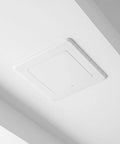 Straight Up White Abs Access Panel Cover For Ceiling Maintenance And No Sweat Pipe Concealing Universal Drywall Patch Seamless Drain Tube Shield Smooth Indoor Plumbing Solution installed on a white ceiling.