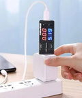 USB Power Meter And Current Tester With LCD Display 3-9V 0-5A Voltage Tester Multimeter in use with a power adapter