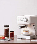 Fully Automatic Coffee Machine With Built In Grinder And Milk Frother Espresso Maker For Home Brews on a kitchen counter