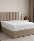 Buttery Soft Organic Cotton Queen Fitted Sheet Featuring 12 Inch Deep Pockets snugly covering a queen mattress in a modern bedroom.