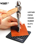 Using 6 Piece Hollow Hole Punch Set With Free Cutting Mat for precise leather crafting, hammer striking tool on leather piece