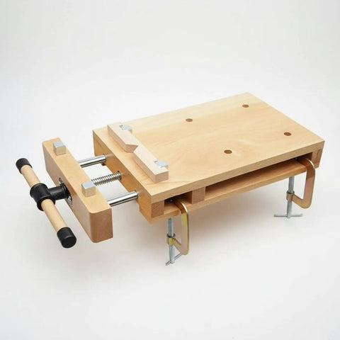 Solid Beech Wood Portable Workbench Vise And Bench Clamp Tool For DIY Pros with compact design and rotating handle.
