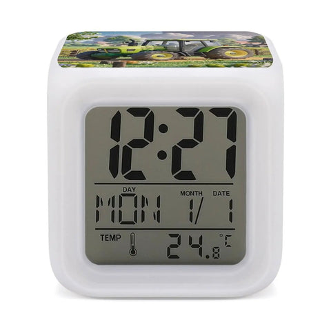 Tractor Farm Alarm Clock With 7 Color Changing Night Light, Digital Temperature Display on a white cube desk clock.