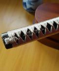 Close-up of Samurai Katana Tsuka Handle 10.2 Inch Do It Yourself DIY Grip Upgrade with alloy fittings and wrapped Samegawa