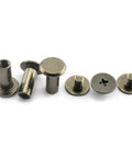 Pack Of 50 Black Chicago Screws Phillips Drive Binding Bolts Copper Plated Steel Rivets For Leather Crafting And Bookbinding displayed on white background.