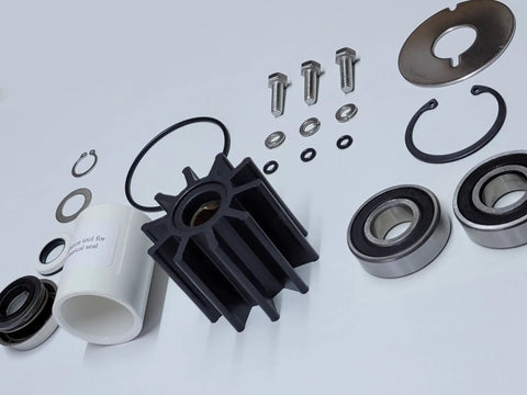 Bearing Housing Assembly Rebuild Kit For Crusader RA134071 Fits Five Point Seven Liter Six Point Zero Liter And Eight Point One Liter Marine Engines With Serpentine Belt Driven Water Pumps Compatible With Pumps RA057032 RA057034 RA057035 And Impeller, kit parts laid out