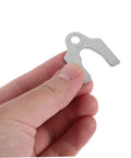 Hand holding a steel shim from 144 Piece Auto Body Shims Kit For Car Body Panels And Sheet Metal, Durable Precision Steel Alignment Sticks With Universal Compatibility For Shops And Pros, Fast Panel Alignment And Leveling For Quick Repairs.