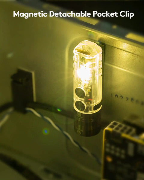 Pocket EDC USB C Rechargeable Flashlight With Magnetic Clip Bright White LED illuminating a toolbox, showcasing the magnetic attachment.