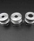 Heavy Duty Alloy GT2 Synchronous Timing Pulley Five Pack With 25 Teeth 6mm Wide And 8mm Bore on black background