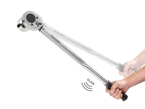3/4 Inch Drive Micrometer Torque Wrench With Audible Click And High Contrast Dual Range Scale in use, demonstrating click feature.
