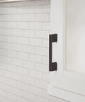 Oil Rubbed Bronze Cabinet Pull 3 Inch Center To Center 4 1/16 Inch Overall Length Cityscape Collection on white cabinet
