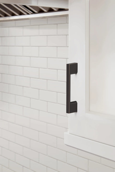 Oil Rubbed Bronze Cabinet Pull 3 Inch Center To Center 4 1/16 Inch Overall Length Cityscape Collection on white cabinet