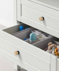 Open dresser drawer with 10 Pack Matte Black And Gold Knurled Cabinet Knobs For Kitchen Cabinets And Dressers Zinc Drawer Knobs installed.