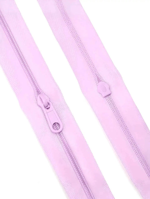 Close-up of two pink nylon zippers with pulls, similar to Complete 4.5 Meter Nylon Zipper Repair Kit With 10 Matching Plastic Pulls For Size 3 Zip Tape