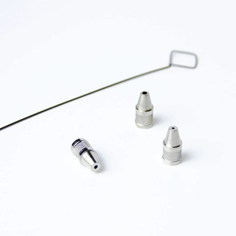 Three soldering nozzles for Go To Automatic Desoldering Pump For Fast Tin Removal, Electric Desoldering Gun shown on white background.