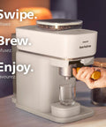 Compact Home Espresso Machine With Built In Grinder And 16 Bar Pump Auto Grinding Tamping And Brewing For Smooth Bean To Cup Coffee Without The Daily Grind Stress, showing a user brewing coffee.