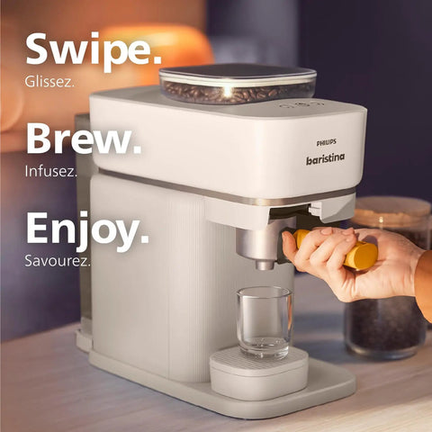 Compact Home Espresso Machine With Built In Grinder And 16 Bar Pump Auto Grinding Tamping And Brewing For Smooth Bean To Cup Coffee Without The Daily Grind Stress, showing a user brewing coffee.