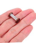 Top Shelf Stainless Steel Knife Handle Screws For Quick Blade Fabrication Featuring Straight Slot Notch Built Tough For Solid Fit On Chef Utility And Parer Knives Real Deal Supply held in hand close-up view.