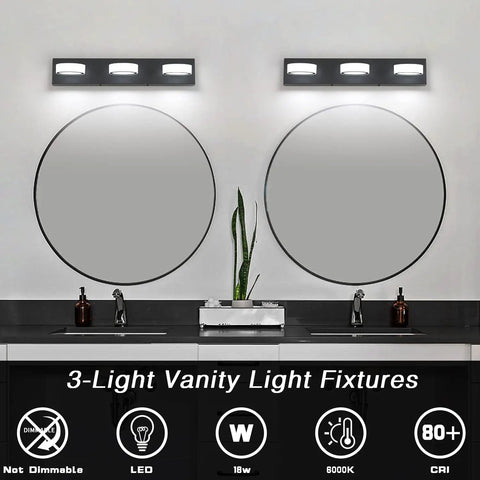 Matte Black Vanity Lights Over Mirror Three Light Modern Bathroom Fixture With Rotatable Oval Lampshades Adjustable 270 Degree Head Swivel 23.6 Inch 18W Cool White 6000K Sleek Bright Spa Style Bath Lighting Lit, installed above round mirrors.