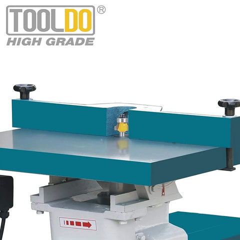 Industrial routing machine with Roundover Router Bit Set With Bearing Guide 1/4 Inch Shank Four Piece Kit For Edge Rounding.