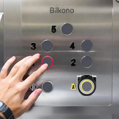 Person pressing elevator button with Eight Piece Push Button Cover Set Keeps You From Accidentally Pressing Buttons On Elevators Washing Machines And Office Equipment With Dustproof Waterproof Plastic Protection visible.