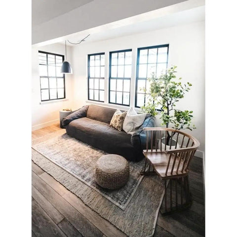 One Light Pendant In Metal Finish With Modern Industrial Style for living room, view of black pendant near couch and windows