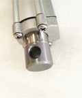 Close-up of 12 Volt Linear Actuator With Potentiometer Dialed In For Precise Motion Control showing metallic piston and screws.