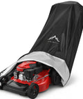 Badass Heavy Duty Waterproof Push Lawn Mower Cover Universal Fit With Double Stitched 600D Oxford Cloth Straight Up Tough Weather Shield For Outdoor Yard Gear Storage Black covering a red lawn mower.