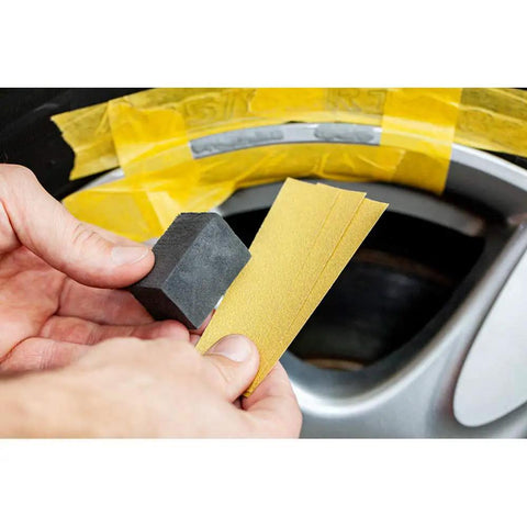 Solid Alloy Wheel Repair Kit For Black Rims Smooths Out Curb Rash And Road Scuffs DIY tools with sandpaper and sponge for alloy repair.