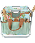 Grab And Go Garden Tool Storage Stool With Detachable Bag And Multiple Pockets Portable Weeding Seat Floral Rose Pattern Rugged Canvas And Jute Build For Easy Outdoor Cleanup, front view showing floral pattern and pockets