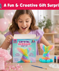 Mermaid Crystal Growing Kit For Kids 6 To 8, STEM Craft Toy That Grows Sparkling Crystals On A Mermaid Tail, Totally Screen-Free, Hands-On Science And Art Project For Young Scientists. Girl holding crystal mermaid craft kit box