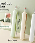 Compact 2 In 1 Needle Threader And Seam Ripper For Sewing Enthusiasts And Seniors next to a bag, showing easy storage and size