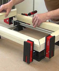 K Body REVO Clamp Kit With 2 24 Inch And 2 40 Inch Clamps KP Block Set Spreader And Woodworking Accessories in use on workbench