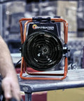 Heavy Duty Portable Forced Air Electric Heater Delivers 3600 Watts At 240 Volts, seen front on workbench.
