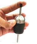 Universal Transfer Punch Center Aligner Tool With Knurled Grip Auto Alignment and Quick Centering shown in hand