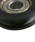 Four Piece U Type Black Pulley Wheel Set With 8mm Shaft Hole And 30mm Diameter For Smooth Rolling Rails Heavy Duty Replacement Roller Bearing Max Load 99kg Ideal For DIY Projects Equipment Upgrades And Garage Setups, black U-type pulley wheel close-up
