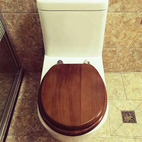 Universal Soft Close Toilet Seat Crafted From Real Solid Wood With Authentic Bark Veneer on a white toilet in a modern bath.