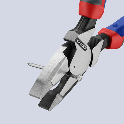 High Leverage Lineman Pliers With New England Head cutting wire, showing serrated knurled jaw, 9-inch multi-component design, pro grade.