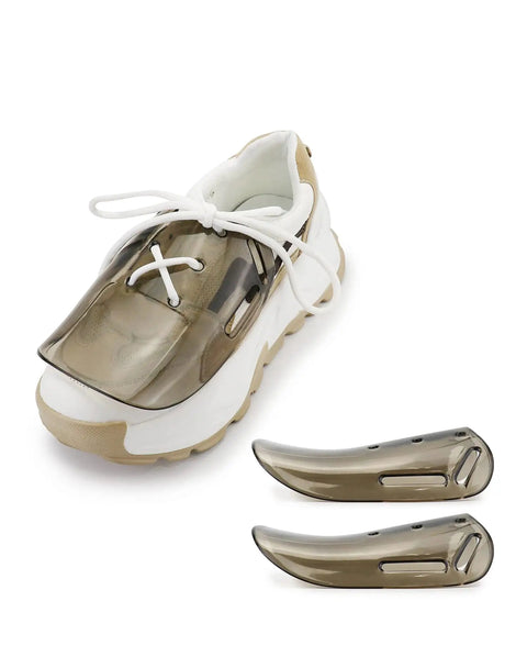 Metatarsal Guard For Safety Footwear, Built Tough Polycarbonate Shield For Metatarsal Protection on a white sneaker and separate cover